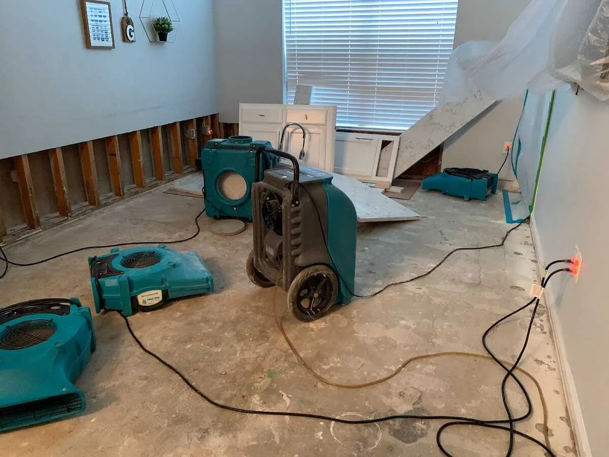 Dehumidifier in flood-cut room for Water Damage Restoration in Fairmont